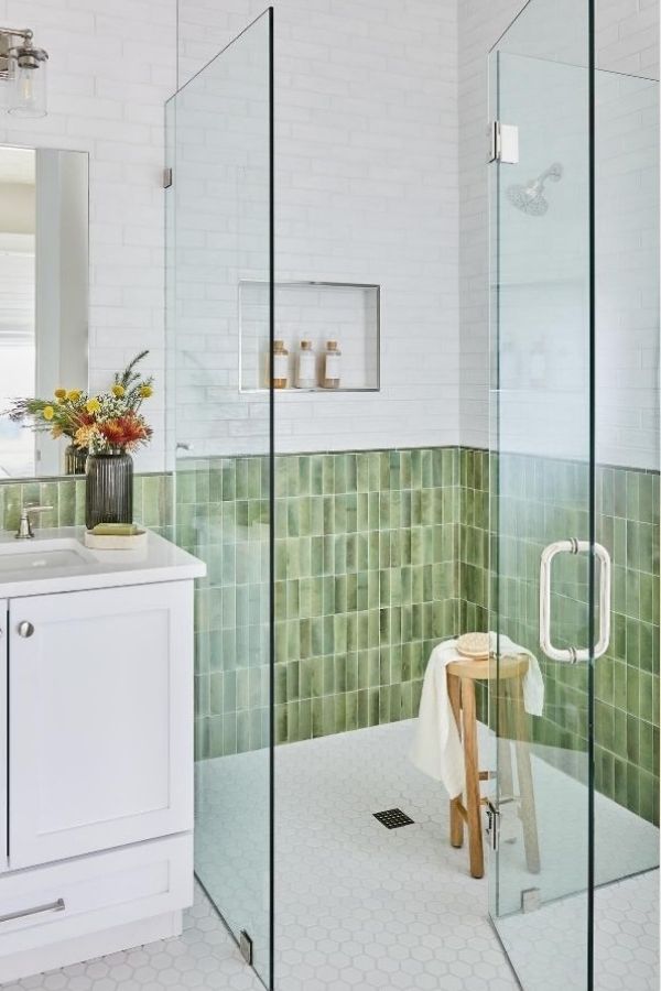 Green bathroom ideas featuring elegant honeycomb floor tiles and lush ambiance.