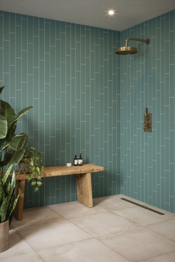 Green bathroom with rustic bench; eco-friendly design, green bathroom ideas.