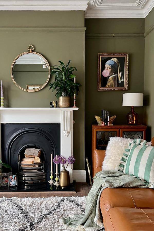 Playful bright colors in modern art piece from @aflickofpaint. Adds twist to classic green living room design.