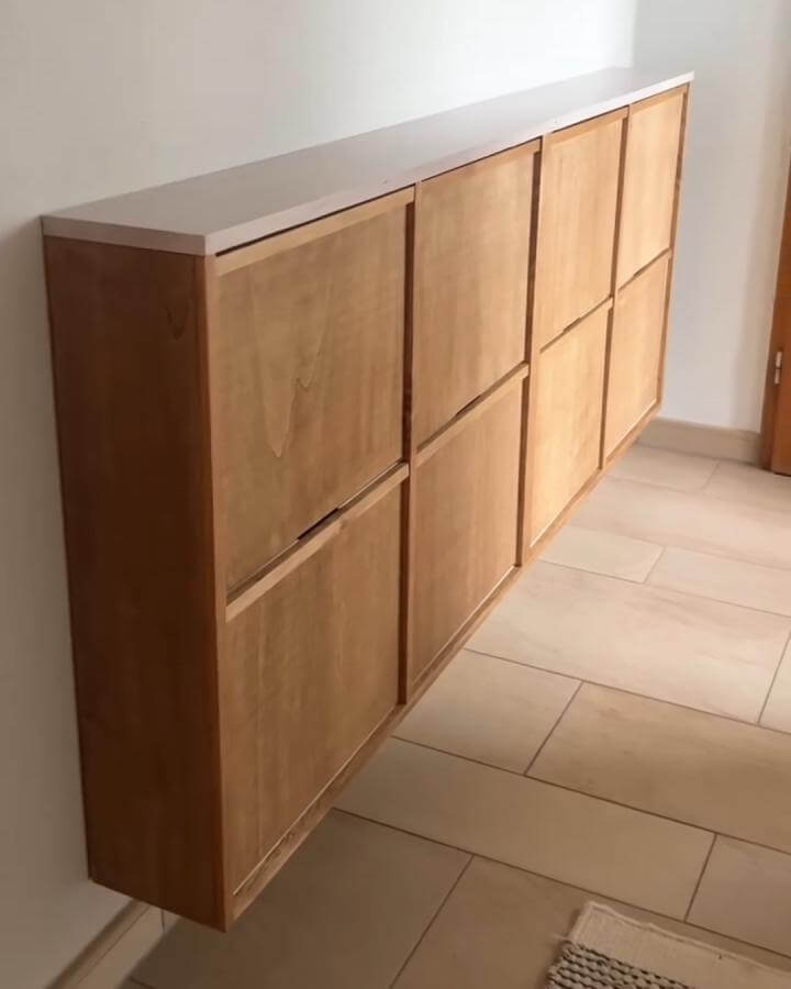 natural wood floating shoe cabinet from @youneek.home with clean lines and japandi style ikea hacks & ideas integration