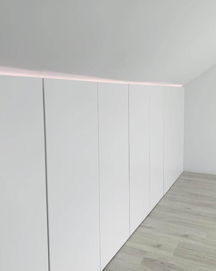white minimalist ikea metod kitchen style cabinets from @uniekhuisje in a calm bright room with led lighting and light wood flooring