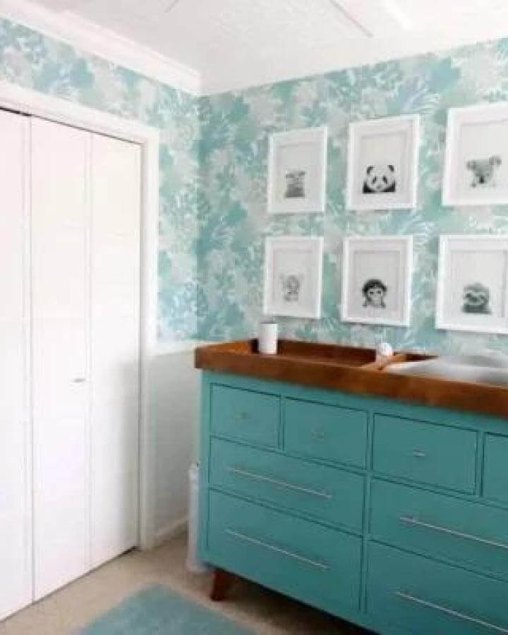 Teal painted Ikea Hemnes dresser with wood top and nursery prints from Charleston Crafted ikea hemnes hacks.