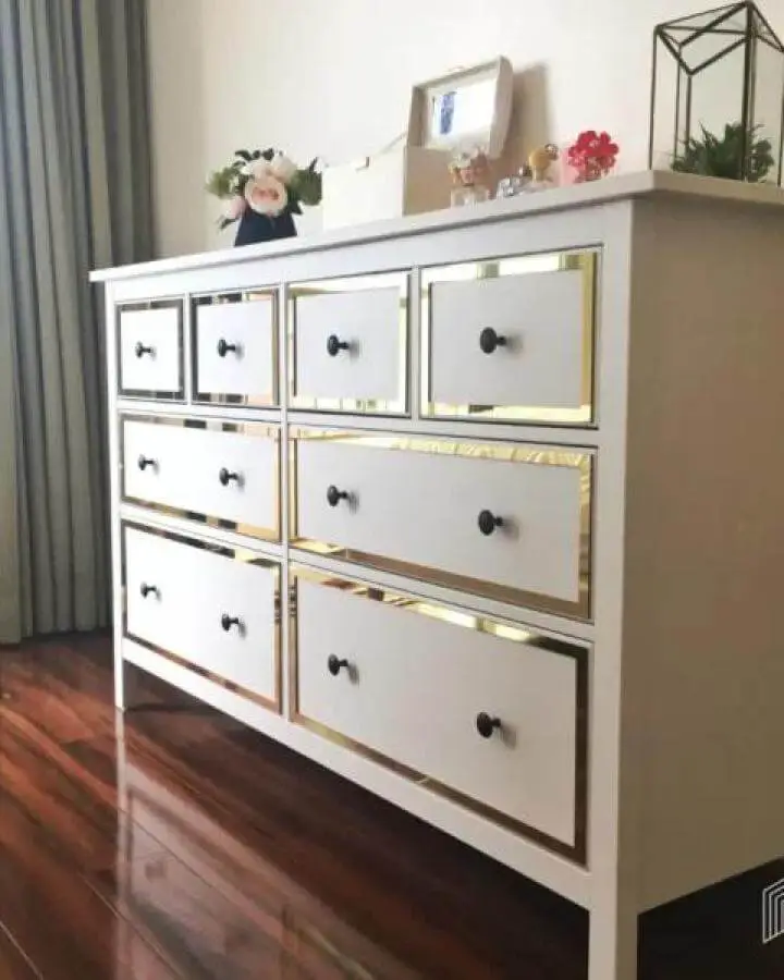 White Ikea Hemnes dresser with black knobs and shiny gold trim on drawers from Lux Hax glowing in a bright room
