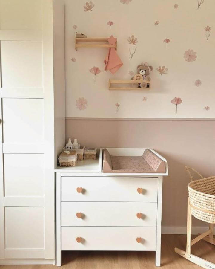 White Koppang dresser with peach heart knobs and floral wall decals in soft nursery setting from @droganaswoje.