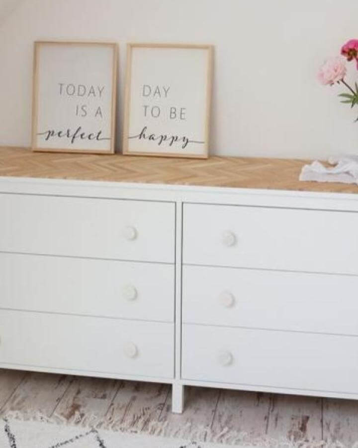 White Ikea Koppang dresser with a light wooden parquet-style top from DIY Carinchen showing a creative ikea koppang hacks upgrade.