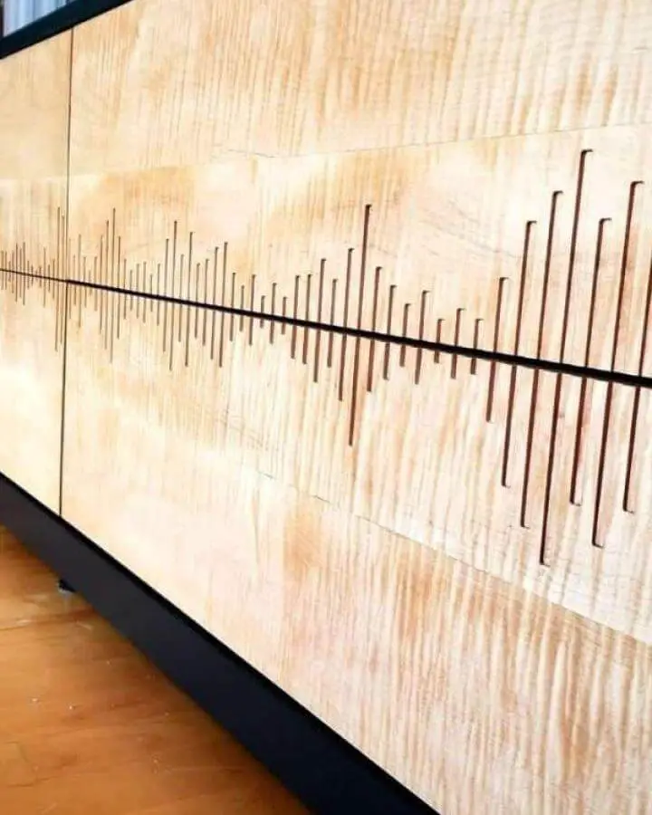 Light maple wood Ikea Nordli dresser with black soundwave pattern cutout from Instructables, modern personalized storage hack.