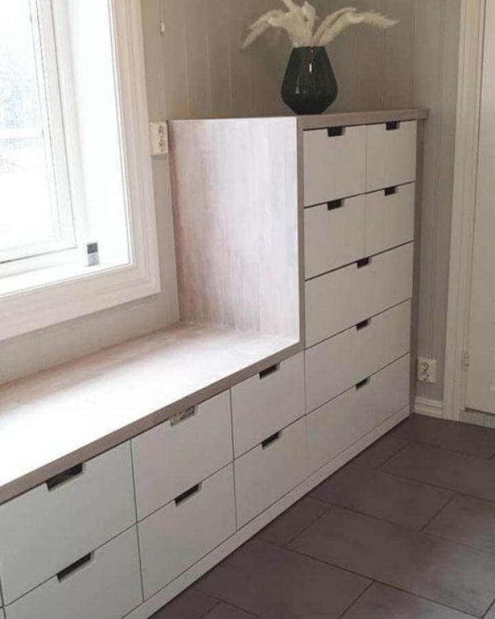 white nordli drawer storage bench with wood veneer top in hallway from @malene.fk ikea nordli hacks