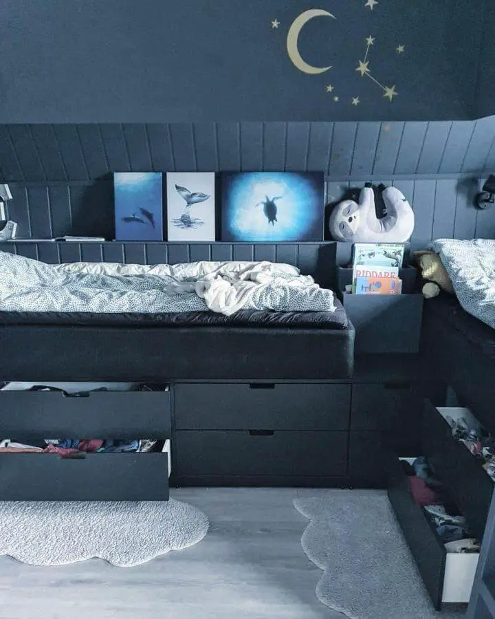 dark navy Ikea Nordli hacks bedroom with underbed drawers and side pockets from @villakvarnbranna maximizing storage and cozy style