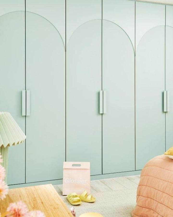 mint-green Ikea Pax wardrobe doors with arch detail from @andthentheywentwild featuring soft pastel paint and minimalistic handles ikea pax hacks