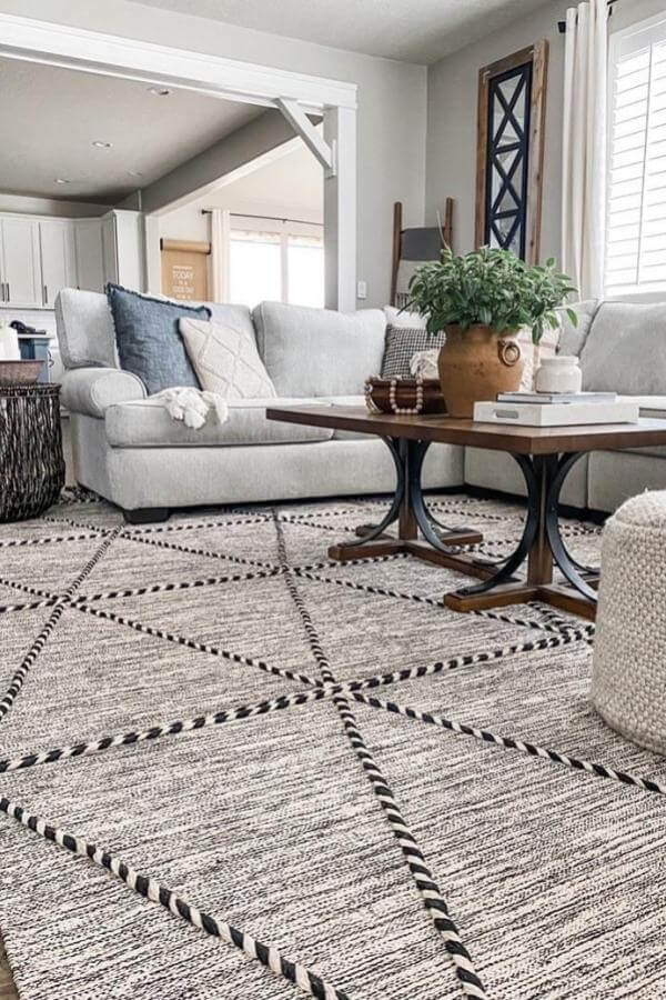 Geometric Harmony rug complements living room. Stylish design for living room rug ideas.