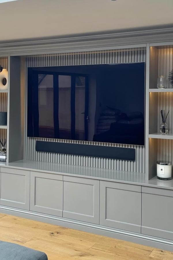 Sophisticated gray lines create harmony; innovative media wall ideas inspire.