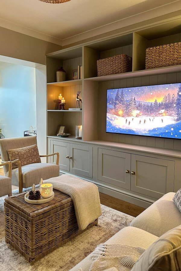 Warm glow and cozy comfort envelop media wall ideas beautifully.