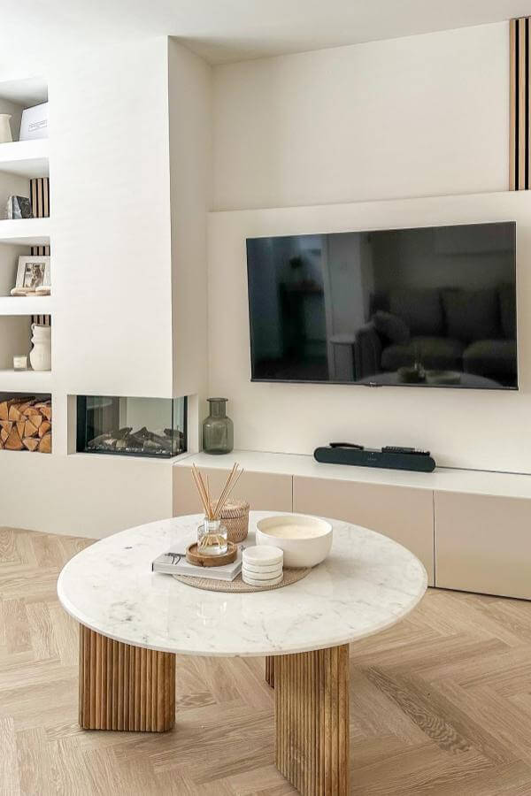 Minimalist marvel in neutral tones features innovative media wall ideas.