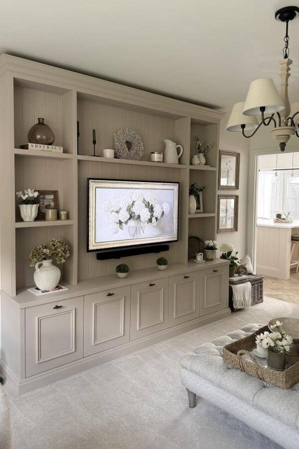 Chic media wall ideas featuring tranquil dove gray display design.