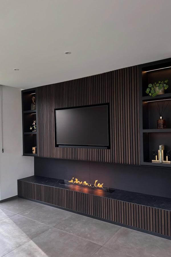 Warm sophistication with vertical lines enhances modern media wall ideas.