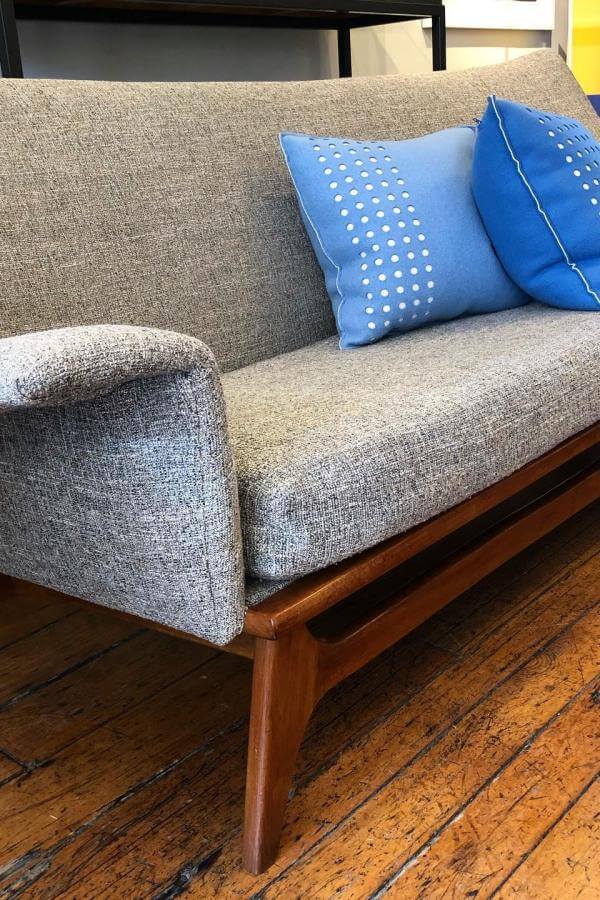 Teal velvet sofa from @inabstractomcm. A textured cozy retreat exemplifies versatile mid-century modern charm.