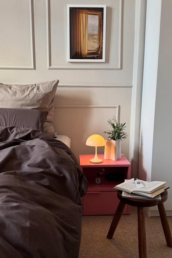 Enchanting shadows, cozy embrace: explore moody bedroom ideas for inspiration.