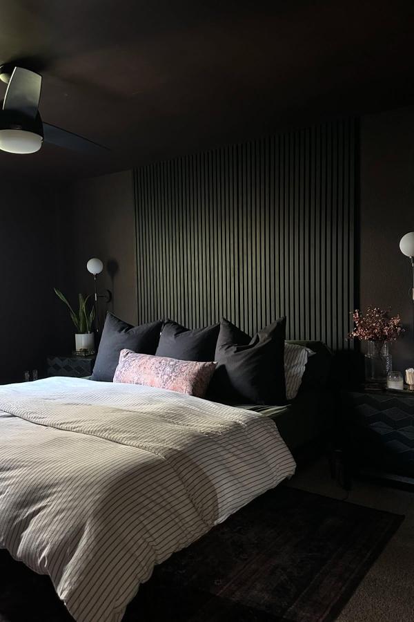 Moody bedroom ideas: Inky Elegance transforms spaces with dark, sophisticated tones.