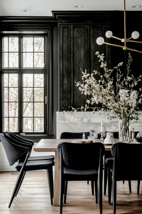 Moody dining room with marble accents showcasing moody dining room ideas.