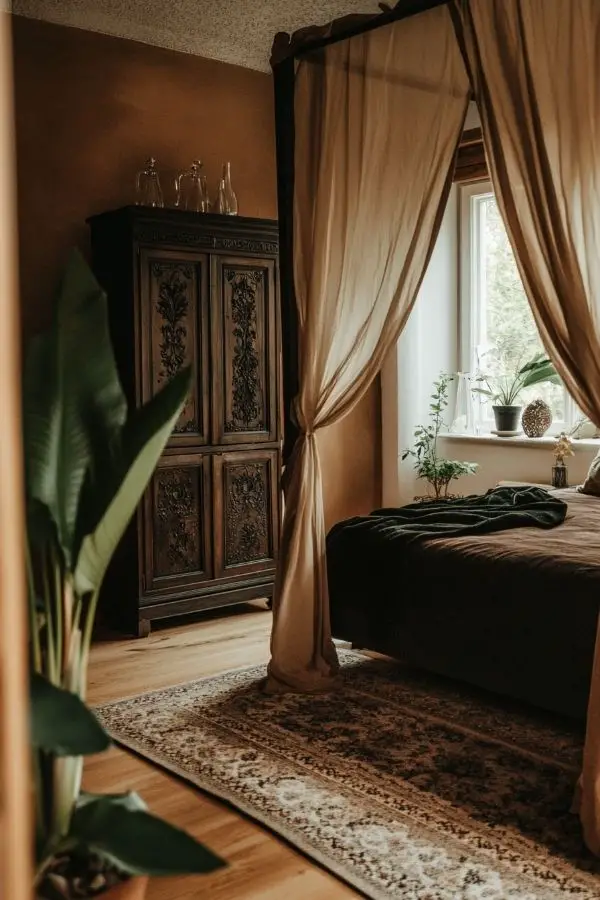 Moody romantic bedroom with dim lighting, plush bedding, and candles.