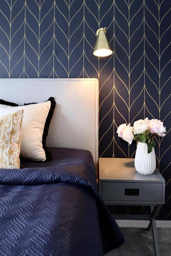 Gold leaf wallpaper in navy bedroom from @wrhl_design. Adds luxe drama and elegance with rich textures.