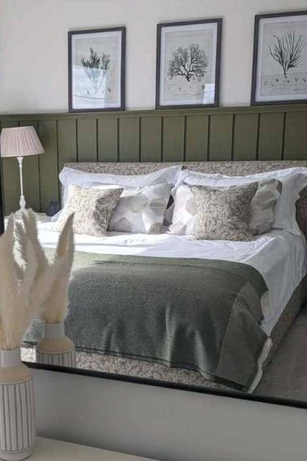 Paneled olive wood headboard set from @myhuckleberryhome. Enhances a calming olive green bedroom mood.