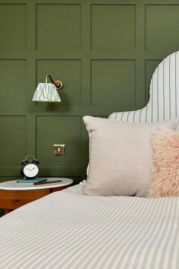 Sophisticated olive green panel accent wall from @lick. Elegant olive green bedroom ideas with modern style.