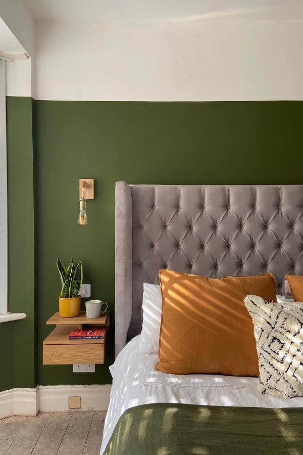 Sleek floating nightstand in cozy neutrals from @renovating_the_broadway. Complements olive green bedroom ideas seamlessly.