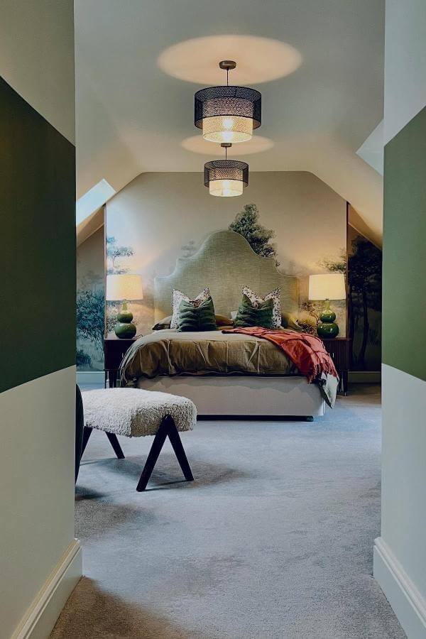 Olive green bedroom mural from @cranberryhome. Forest-inspired art creates a cozy, transformative retreat ambiance.