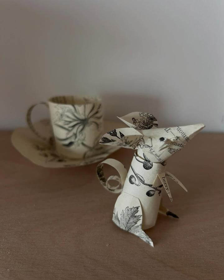 Vintage botanical paper mouse sculpture and matching paper cup from @clareyoungs. Intricate textures and curled shapes in paper crafts for adults.