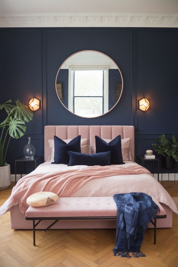 pink and navy bedroom with geometric patterns and cozy decor accents