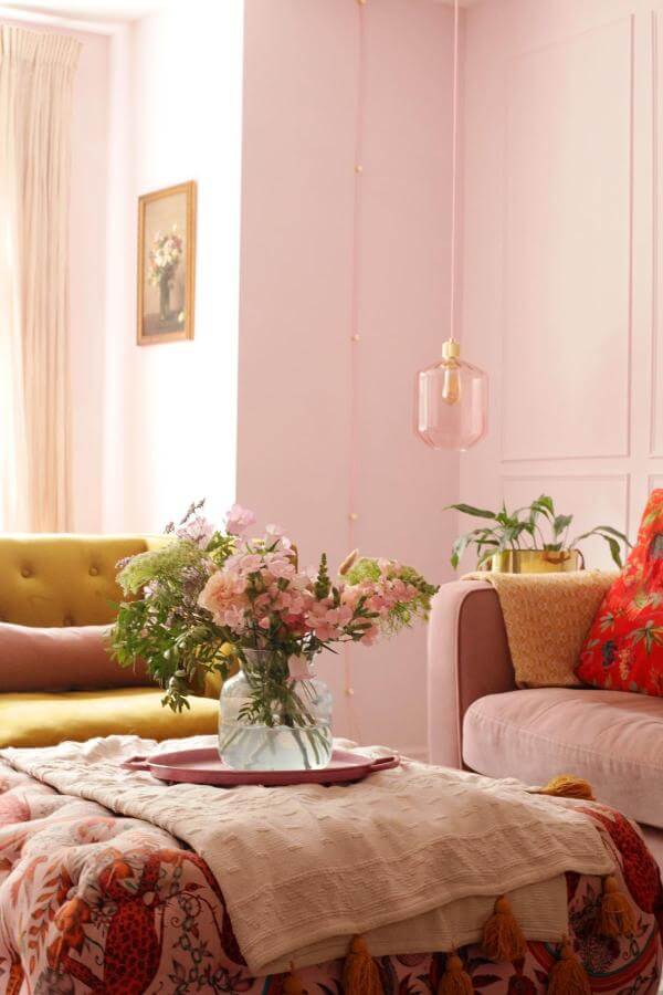 Cozy pink living room ideas featuring plush seating and pastel decor.