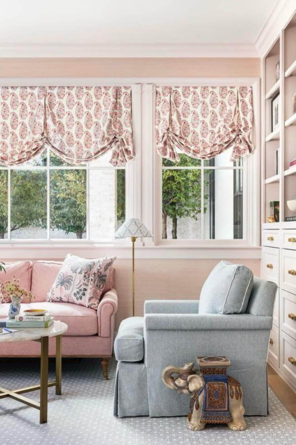 Elephant accents transform classic elegance in stunning pink living room ideas.