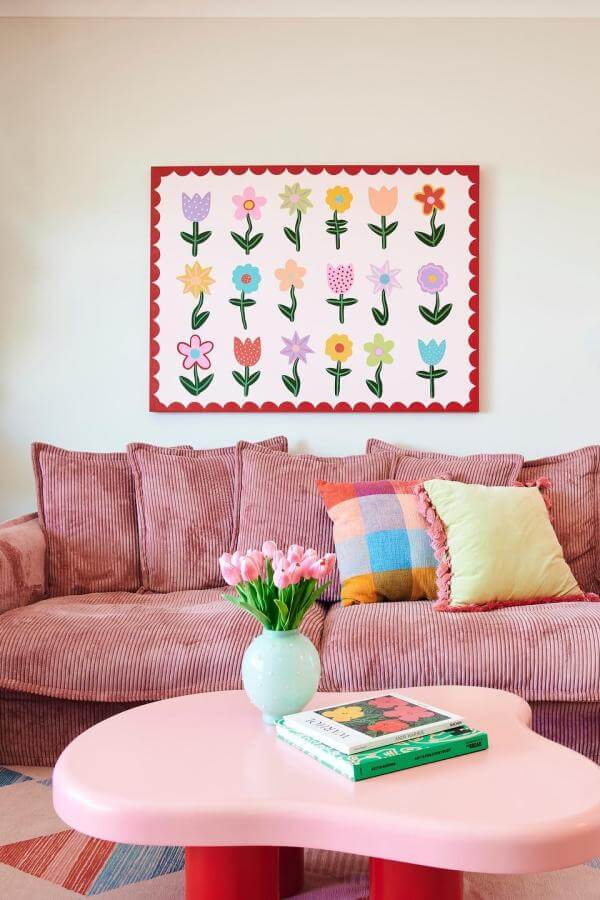 Artful whimsy meets pastel charm: creative pink living room ideas.