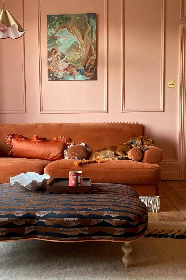 Burnt orange elegance complements pink living room ideas beautifully.