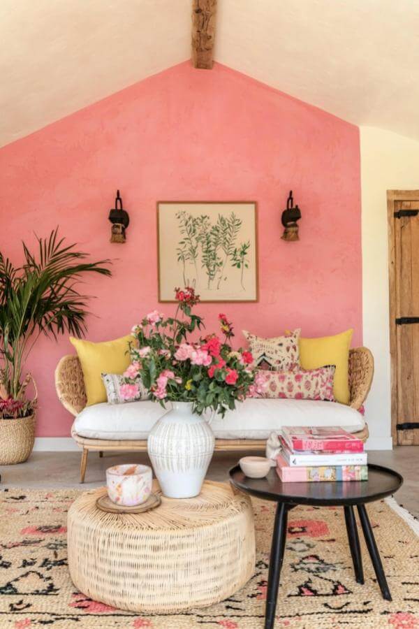 Woven elegance intertwines with vibrant pink, inspiring pink living room ideas.