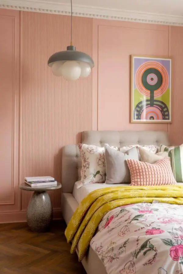 Bold pink and black abstract wall art from modern pink teenage girl bedroom ideas enhances youthful vibrancy.