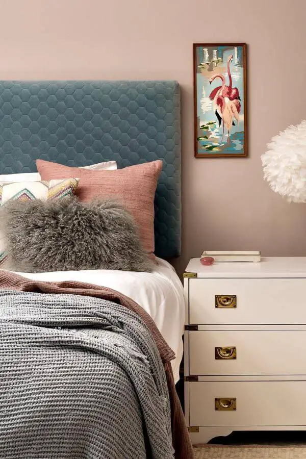 Pink flamingo art piece adds whimsical chic flair to a pink teenage girl bedroom from @kimstephen_interiors.