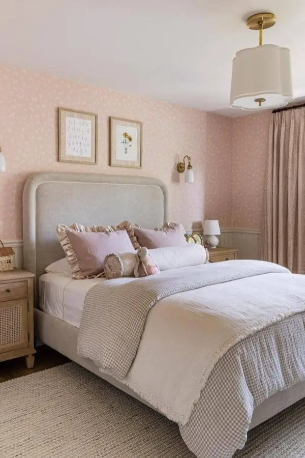Soft pastel ruffled pillows from @mindygayerdesign add cozy charm to a pink teenage girl bedroom setting.
