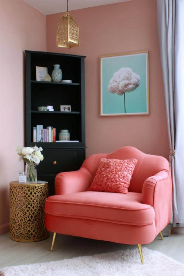 Cozy pink velvet chair from a pink teenage girl bedroom adds playful glam touch and comfort.