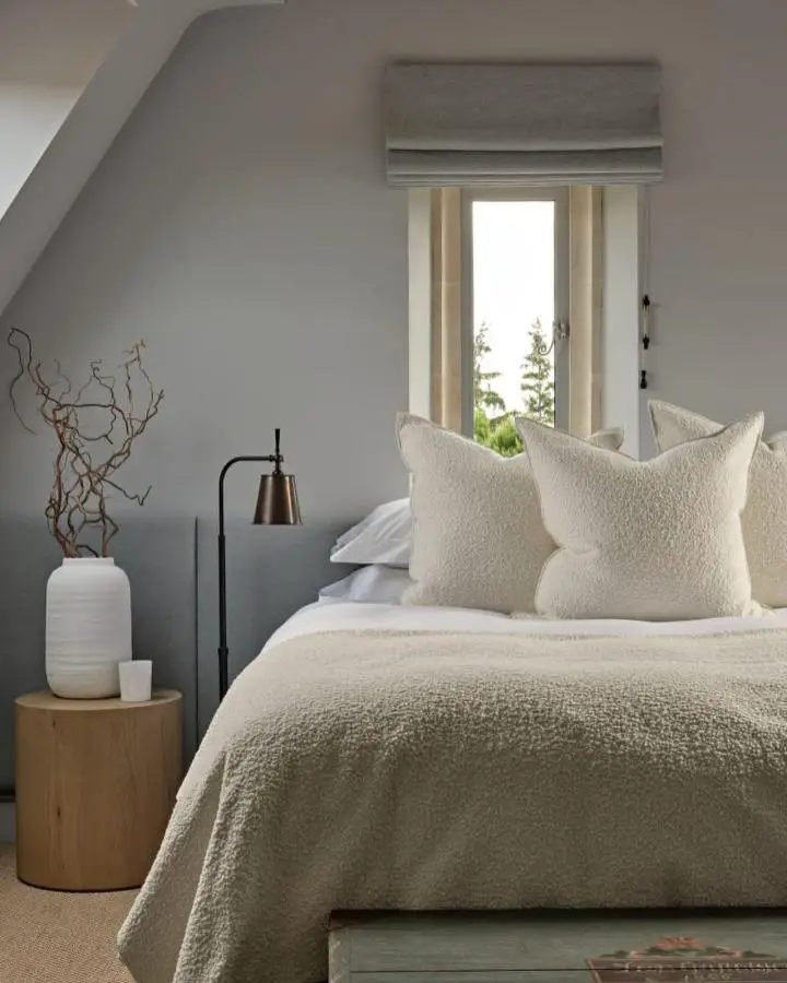 Sage green textured bedding from @camillabellordinteriors creating a calming relaxing bedroom sanctuary with natural tones.