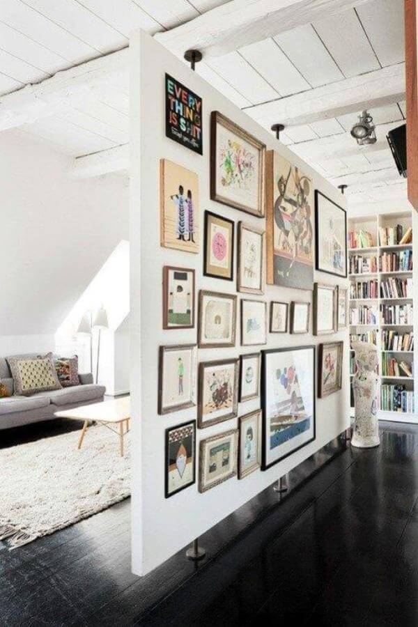 Artful gallery wall with creative room divider ideas, enhancing space.