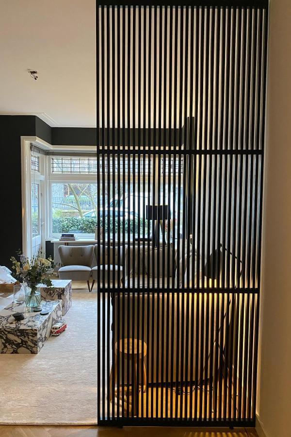 Sleek symmetry showcased: modern elegance for innovative room divider ideas.