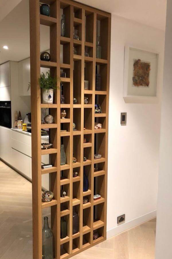 Warm oak grid showcases whimsy: creative room divider ideas in style.