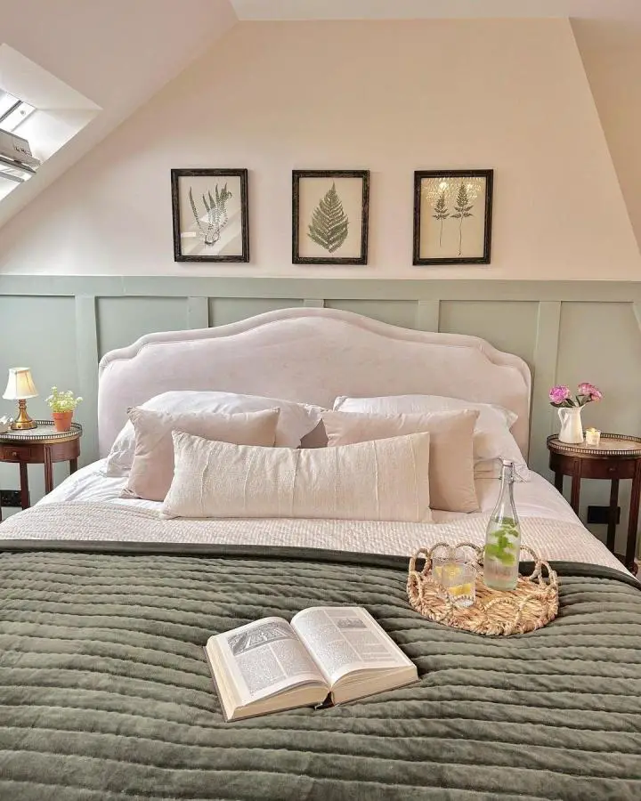 Sage green quilted bedding with botanical wall art from @loafhome. Natural textures and earthy tones create cozy atmosphere.