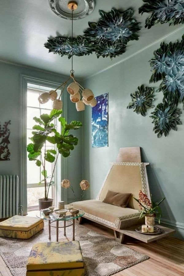 Sage green living room with whimsical ceiling; sage green living room ideas.