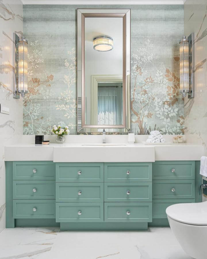 sage green powder room ideas with classic vanity and botanical wall mural by @mihai.georgiadi. Serene and stylish bath design.