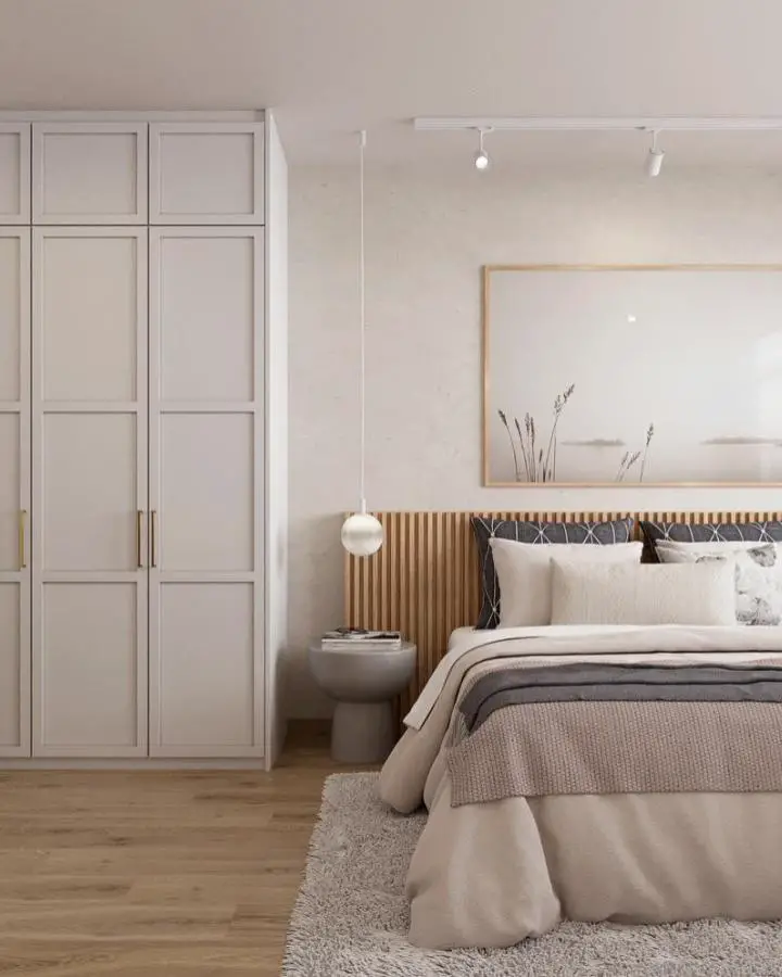 Minimalist bedroom with wooden slat headboard showcasing natural textures for scandi bedroom ideas from @pamxcanvas.