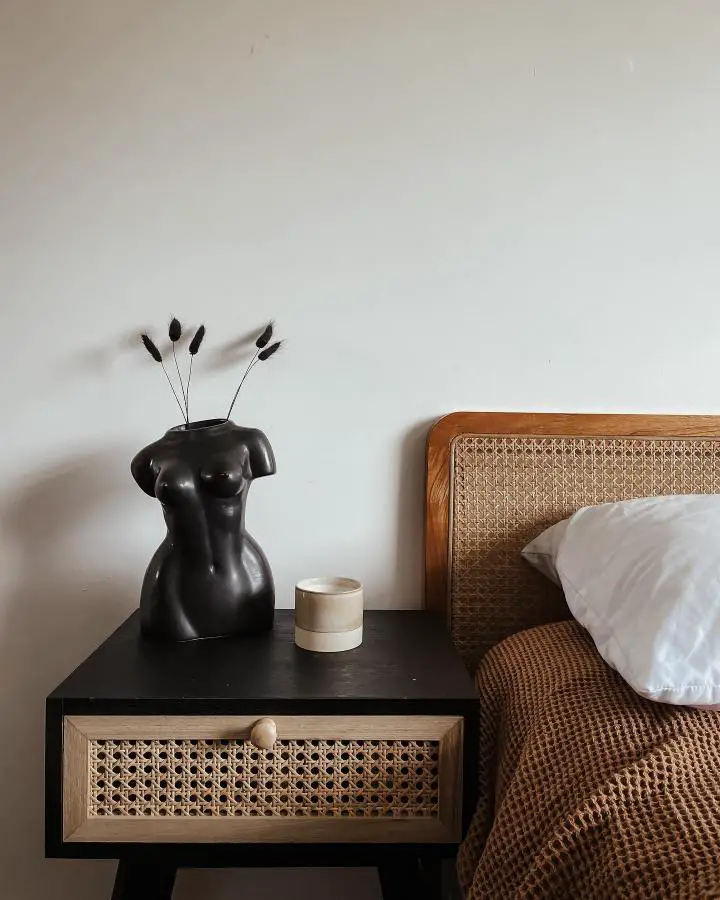Black nightstand with natural cane webbing from @renovatingnumber64. Matches coordinating headboard perfectly.