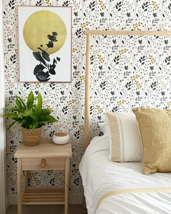 Botanical wallpaper bedroom from @no5ishome showcasing scandi bedroom ideas with natural wood furniture and green plant accents.